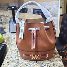 I'm Selling My Brand New Michael Kors Reed Medium Bucket Bag With Tags. Measurements Are 9.25" W X 8.5"H X 5.5"D. Color Is Luggage. Dust Bag Included. Bags Michael Kors, Michael Kors Bag, Bucket Bag, Shoulder Bags, Dust Bag, Michael Kors, Bag Lady, Shoulder Bag, Brand New