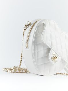 Chanel Heart Bag Large in White Lambskin with Gold Hardware & leather looped crossbody chain. Un & 100% d. Supplied with Chanel box, dustbag, ribbon and ation microchip. Dimensions: 16.5 × 18 × 6.5 cm DETAILSLambskinGold HardwearLarge16.5 × 18 × 6.5 cmNeed assistance? Use our Sourcery service or speak to a member of our team via WhatsApp Chanel Heart Bag, White Hardware, Chanel Box, Heart Bag, Chanel Model, Vuitton Bag, Champagne Gold, White Bag, Large White