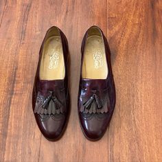 "Vtg Ferragamo mahogany leather loafers. They're a bit darker in person, black and mahogany blend. minor wear, very good condition.  Marked men's size 10 but they're vintage so probably run small so probably best on a men's 9.5 possibly even a 9 (you can always put heel pads in them, I prefer shoes on the bigger side for comfort anyhow) Or a women's size 10.5-11. Measurement from back of heal to toe 11.5\" (from the outside)" Burgundy Slip-on Loafers For Formal Occasions, Burgundy Slip-on Formal Loafers, Vintage Leather Sole Moccasins For Business, Vintage Wingtip Moccasins With Leather Sole, Vintage Almond Toe Moccasins For Formal Wear, Vintage Almond Toe Moccasins For Formal Occasions, Vintage Brogue Loafers For Semi-formal Occasions, Vintage Wingtip Loafers For Semi-formal Occasions, Vintage Business Loafers With Leather Sole