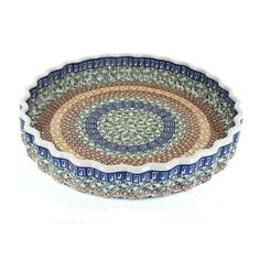 Great for a torte or your favorite quiche! 9.5" diameter x 1.75" deep. The Art of Polish Pottery, as we know it today, started as local folk-art centuries ago in the German province of Silesia. The first known pieces of Bunzlauer stoneware dating back to the 16th century were crafted by hand and decorated with a folk-art stamping technique using potatoes. Original designs were inspired by the peacock feather using the colors of cobalt blue, sage green and ferrous red. These designs and colors ar Blue Sage, The Peacock, Soup Plating, Plastic Plates, Stamping Techniques, Blue Plates, Polish Pottery, Peacock Feather, Gift Card Shop