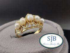 Previously Loved🥰Not New 👑⚪Vintage Pearl Ring⚪👑 Another FANTASTIC Treasure Built in all Glowing 10k Yellow Gold ✨️ Featuring a Beautiful Pearl Ring Design. Peg set with five (5) Shimmering Genuine Pearl ⚪️⚪️⚪️⚪️⚪️ Gemstones, measuring in at approximately 4mm each. With a Glowing Golden rope trim Halo surounding each Gem. This AMAZING Vintage Pearl Ring is PERFECT for your upcoming Wedding or Anniversary STUNNING on its own and a SHOWSTOPPER with your Stackable Ring  collection a MAGICAL Vinta Pearl Ring Vintage, Pearl Ring Design, Vintage Pearl Ring, Pearl Rings Vintage, Pearl Engagement Ring, Pearl Rings, Rings Vintage, Special Ring, Vintage Pearl