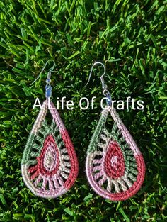 Beautiful handmade crochet earrings, perfect for any occasion, lightweight and crafted with care. These teardrop shape earrings are made with 100% Acrylic crochet thread, using Silver Fish Hook.  They are stiffened so they will maintain their beautiful shape.  These crochet Dangle & Drop earrings will become one of your favorite accessories.  Drop length is 2.75 inches. The color options are endless! Select the drop down to see what's in stock! Some of the designs include a small charm. Crafted with love in a smoke free, pet free environment. **Visit my shop for more cute items** Handmade Teardrop Earrings For Festival, Handmade Dangle Teardrop Earrings For Summer, Handmade Teardrop Earrings For Beach, Handmade Teardrop Dangle Earrings For Summer, Handmade Summer Teardrop Dangle Earrings, Handmade Bohemian Teardrop Earrings For Summer, Bohemian Handmade Teardrop Earrings For Summer, Handmade Pink Bohemian Teardrop Earrings, Bohemian Teardrop Earrings For Summer