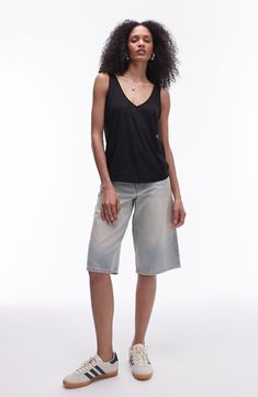 Made from lightweight jersey, this V-neck tank has a slouchy fit that's great for layering or letting the breeze in on hot days. V-neck 50% viscose, 50% polyester Machine wash, line dry Imported Versatile V-neck Tank Top For Summer, Versatile V-neck Tank Top For Everyday, Versatile Cotton V-neck Tank Top, Relaxed Fit V-neck Tank Top For Spring, Relaxed Fit Modal Tops For Summer, Casual V-neck Tank Top For Layering, Casual V-neck Tank Top For Everyday, Versatile Everyday V-neck Tank Top, Casual Stretch V-neck Top For Summer