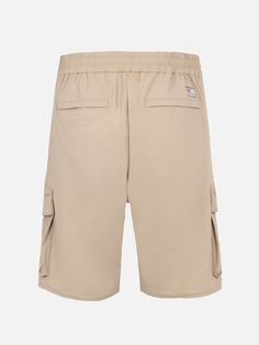 Discover the versatility of our Deck Bermuda shorts, crafted from technical Lycra fabric for enhanced performance. With its water-resistant properties and lightweight, breathable design, these shorts are perfect for all your outdoor adventures. The Deck Bermuda shorts are constructed from technical Lycra fabric, offering water-resistant capabilities and exceptional breathability. The elasticated waistband features a drawstring button closure for a secure and comfortable fit. Multiple pockets, in Summer Hiking Short Cargo Pants, Utility Nylon Cargo Shorts With Elastic Waistband, Summer Hiking Cargo Shorts With Multiple Pockets, Casual Solid Color Shorts For Outdoor, Casual Solid Color Outdoor Shorts, Cotton Athletic Shorts For Outdoor, Summer Nylon Short Cargo Pants, Outdoor Cotton Athletic Shorts With Elastic Waistband, Short Nylon Cargo Pants For Summer