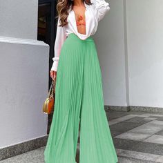 Chic and comfortable in a plisse pleated wide leg pants. Style: Elegant Fit: Loose Fabric: Polyester Pattern: Solid Element: Non Rise: High Rise Product Type: Wide Leg Pant Length: Full Main Composition: Polyester Season: Spring/Fall Korean Fashion Pants, Celana Fashion, Green Street, High Waist Wide Leg Pants, Trouser Outfits, Pants Women Fashion, Loose Trousers, Pantalon Large, Urban Chic