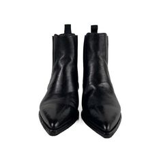 The noelie black leather boots are handmade in italy and feature a sophisticated silhouette with a deep-dyed finish. this sleek model is mounted on a robust rubber-injected sole with a slanted heel ensuring lasting wear.    - handcrafted in italy  - pointed toe  - heel height : 1.6"  - lining and insole : leather  - sole : leather & rubber injection  - upper : leather  - fit runs true to size Classic Chelsea Boots With Sculpted Heel For Fall, Western Style Formal Heeled Boots With Leather Sole, Western Style Ankle-high Chelsea Boots With Leather Sole, Black Pointed Toe Chelsea Boots With Leather Sole, Pointed Toe Chelsea Boots With Leather Sole, Formal Chelsea Boots With Heel Pull Tab For Fall, Black Chelsea Boots With Pointed Leather Sole, Business Chelsea Boots With Leather Lining And Pointed Toe, Classic Pointed Toe Boots With Rubber Sole