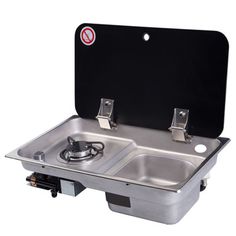 a stainless steel sink with two burners and nozzles on the front side