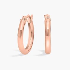 A style essential, these petite hoop earrings are crafted from 14k rose gold tubing for a polished, lightweight look, finished with a latch back closure. Classic 14k Rose Gold Round Earrings, Classic Rose Gold Hypoallergenic Huggie Earrings, Rose Gold Polished Finish Hoop Earrings For Formal Occasions, Classic Hypoallergenic Rose Gold Huggie Earrings, Rose Gold Polished Hoop Earrings For Formal Events, Classic Rose Gold Huggie Earrings, Formal Rose Gold Hoop Earrings With Polished Finish, Rose Gold Polished Finish Formal Hoop Earrings, Classic Rose Gold Earrings With Polished Finish