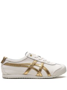 Onitsuka Tiger Mexico 66™ "White/Gold" Sneakers - Farfetch Gold Onitsuka Tiger, Gold High-top Sneakers With Vulcanized Sole, Gold Slip-on Sneakers With Rubber Sole, Gold Sneakers With Contrast Sole For Streetwear, Gold Sports Sneakers With Rubber Sole, Gold Sneakers With Rubber Sole For Sports, Gold Low-top Sneakers With Contrast Sole, Gold Leather Slip-on Sneakers, Gold Sneakers With Vulcanized Sole For Streetwear