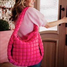 Indulge in luxury with our Hot Pink Oversized Hobo Tote. The hot pink hue exudes confidence and the quilted design adds a touch of elegance. Perfect for everyday use, this oversized bag effortlessly adds a pop of color to any outfit. Truly a must-have for any fashion-forward individual. Pink Puffer Bag, Spring Garden Decor, Puffer Bag, Hobo Tote Bag, Pura Vida Bracelets, Oversized Bag, Bookish Gifts, Madame Alexander, Perfect Bag