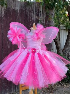 Welcome to Baby/Infants Clothing  by Funkids&Us Boutique Magic Pink  Fairies tutu dress   Everyone dream to be a   fairy ` This tutu  dress is super cute and adorable it is perfect for  birthdays, photographs, Halloween party  or everyday dress up.dress up!  This tutu dress is made premium tulle of hot pink and pink with glitter pink tulle . Dress is made of pink crochet tutu top embellishment  of gorgeous flowers. The tutu skirt part is a mix color combination of tulle in hot pink and pink colo Cheap Pink Princess Tutu Dress, Cheap Pink Tutu Dress For Summer, Cheap Pink Spring Tutu Dress, Cheap Pink Tulle Tutu Dress, Fotos Halloween, Pink Fairies, Dress With Wings, Fairy Headband, Tutu En Tulle