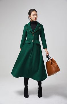 "This stunning dark green wool coat for womens is beautifully fitted and tailored for a classic, feminine design. There is a brooch decoration on lapels.The long wool coat features dark green, a slim fitting bodice with long sleeves and fitted waist leading into a long,flowing skirt coat. Details : * dark green wool blend fabric with polyester lining * two pockets * button closure in front * lapel collar * long sleeves * brooch decoration * winter coat, spring coat, womens coat * mid calf length Elegant Green Wool Outerwear, Elegant Formal Green Outerwear, Elegant Green Formal Outerwear, Elegant Green Wool Coat, Elegant Green Long Wool Coat, Elegant Green Wool Coat For Winter, Elegant Green Outerwear With Lapel Collar, Elegant Green Wool Coat For Fall, Elegant Green Outerwear For Office