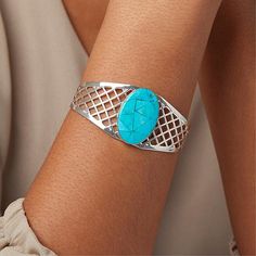 Jay King Sterling Silver Azure Peaks Turquoise Doublet Cuff Azure Peaks turquoise inlays of various shades form this openwork bracelet's freeform doublet. It's a cool and multi-tonal treat for your trove of Mine Find treasures.       Approx. 6-3/4"L x 1-3/16"W; fits 6" to 7" wrist      Stamped .925 sterling silver; polished finish   Stone Information       All sizes and weights approximate     Stabilized Azure Peaks Turquoise Doublet: Freeform (2x4-5x8mm); mined in Mongolia Modern Turquoise Cuff Bangle, Modern Turquoise Cuff Bangle Bracelet, Modern Turquoise Bracelet Jewelry, Modern Turquoise Bracelet, Color Bands, Beading Wire, Cuff, Jewelry Design, 925 Sterling Silver