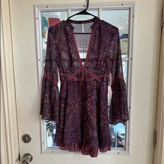 Free People Purple Paisley Mini Dress, Deep V Neck, Flare Sleeves Paisley Print V-neck Party Dress, Long Sleeve Party Dress With Paisley Print, Long Sleeve Dresses With Paisley Print For Party, Fall V-neck Mini Dress With Paisley Print, Purple Bohemian Mini Dress For Fall, Fall Paisley Print V-neck Mini Dress, Fitted Paisley Print Mini Dress For Fall, Casual Paisley Print Mini Dress For Party, Purple Paisley Print Dress For Spring