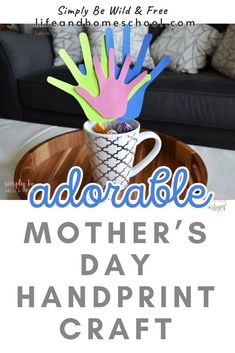 a coffee cup filled with handprinted paper and the words adorable mother's day craft