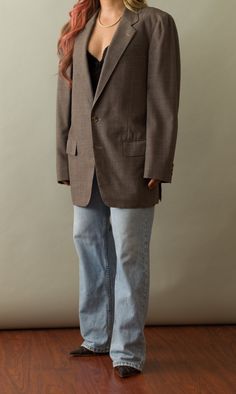 Absolutely beautiful Italian ash wood gray jacket with accents of brown, button front closure, long tailored sleeves, pointed shoulder, featuring a gorgeous madras plaid pattern in blue, brown & gray. Super luxurious brown silky lining. So luxe & timeless jacket, such a beautiful color & shape. Changes color in light, to a more neutral brown. Fabric Content: 100 Wool x 100 Polyester Lining. Unisex Brown Jacket: Best fits XS-Large depending on desired fit. This item is not pinned. Model is S, 5'4 Pointed Shoulder, Timeless Jacket, Madras Plaid, Brown Blazer, Ash Brown, Tailored Blazer, Brown Fabric, Brown Jacket, Womens Blazers