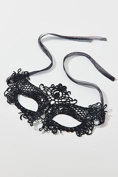 Sheer lace masquerade mask in a classic silhouette complete with soft satin ribbon ties. Features Ivy lace mask Sheer lace masquerade mask Satin ribbon tie finish Content + Care Polyester, nylon Spot clean Imported | Ivy Lace Mask in Black, Women's at Urban Outfitters Fancy Mask, Lace Masquerade Mask, Lace Masquerade Masks, Lace Skull, Lace Mask, Masquerade Mask, Brand Sale, Ribbon Tie, Classic Silhouette