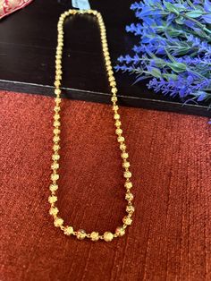 Micro Gold Shiny Beads 24 inches Long Haram 6 MM bead Size /Gold Finish/One Line Haram only/24Inches Long/Gift jewelry/ Indian Jewelry This item is perfect to whear any time for parties and festivals! DETAILS: Includes Only One Line Haram . Necklace: 24  inches. Chain closure. Weighs 0.85oz ( 25g).  Earrings:  Material: Imitation gold Beads Coral Beads Gold Finish  Finish: Premium  Quality gold finish.  NOTE: I try my best to show you photos of my products as they appear in real life, but please Adjustable Gold Mala With 8mm Beads, Gold Long Necklace With Round Beads For Gift, Festive Adjustable 8mm Beaded Jewelry, Traditional Long Necklace With Beaded Chain And Round Beads, Traditional Long Necklace With Round Beaded Chain, Traditional Long Necklace With Beaded Chain, Festive 8mm Round Bead Necklace, Faceted Beads Chain Necklace As Gift, Gold Chain Necklace With Round Beaded Details