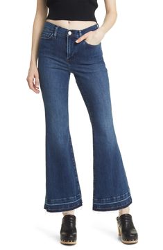 Released raw hems relax the style of casual-chic flare jeans made from soft, lightweight stretch denim in a polished dark-indigo wash. 31" inseam; 22" leg opening; 11" front rise; 15" back rise (size 29) Zip fly with button closure Five-pocket style 77% cotton, 18% modal, 4% elasterell-p, 1% elastane Machine wash, dry flat Made in Turkey Released Hem Jeans, Latest Jeans, Raw Hem Jeans, Hem Jeans, Dark Indigo, Silver Jeans, Stretch Jeans, Cropped Jeans, Flare Jeans