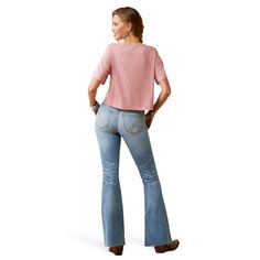 This mid-rise flare jean is your soon-to-be fave! The versatile light wash, raw hem, and subtle distressing go with everything from tees to performance tops. Plus, the subtle A stitched on the back pocket lets you rep Ariat® wherever you go. R.E. A.L. MR Hallie Flare Jean | Product Features : 0 : Contoured waistband hugs your curves for a fit that moves with you | Women's R. E.A. L. Mid Rise Hallie Flare Jeans in Colorado 9.75 oz ring-spun stretch denim. 95% Cotton, 4% Elasterell-P, 1% Lycra® sp Denim Blue Mid-rise Tops For Fall, Fitted Dark Wash Tops With Frayed Hem, Fitted Pink Denim Top, Fitted Pink Flare Denim Jeans, Pink Fitted Denim Top, Fitted Pink Denim Flare Jeans, Mid-rise Flare Jeans With Frayed Hem In Medium Wash, Mid-rise Washed Flare Jeans In Rigid Denim, Mid-rise Distressed Rigid Denim Flare Jeans