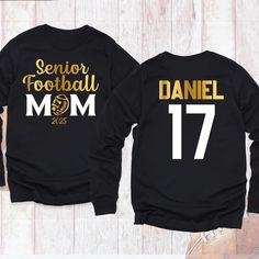 Senior Football Dad Sweatshirt, Customize Senior Football Mom 2025 Long Sleeve Shirt, Senior Night Football Hoodie, Football Fan Sweatshirts. Welcome to My Store! Show your pride with the Senior Football Mom Dad Sweatshirt! This cozy Custom Senior Football Mom 2025 Long Sleeve is perfect for cheering on your player at every game. Whether it's for game day, senior night, or just showing off your support, this sweatshirt is a must-have for proud football parents. The Senior Football Mom Dad Sweats Black Long Sleeve Sweatshirt With Name Print, Long Sleeve Hoodie With Letter Print For Football Season, Long Sleeve T-shirt For Football Season, Long Sleeve Letter Print T-shirt For Football Season, Long Sleeve T-shirt With Letter Print For Football Season, Long Sleeve Letter Print Football T-shirt, Long Sleeve T-shirt With Name Print For Sports Events, Long Sleeve Tops With Name Print For Sports Events, Long Sleeve Tops With Name Print For Sports