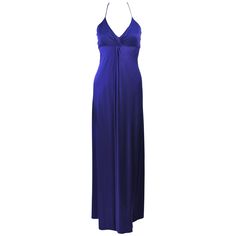 This Elizabeth Mason Couture gown is composed of a purple silk jersey and features a draped design. There is a halter style neckline. This effortlessly chic gown can be styled in a variety of fashions. Made in Beverly Hills. The gown may be fashioned in a variety of colors. This is a couture custom order. Please allow for a 60 day lead time from measurements, fabric selection, patterning, toile fitting, to final product. The dress shown is a sample size 2. The sample is not for purchase. Measurements of sample size: Length: 56" Bust: 29" Waist: 28" Hip: 42" Gowns Purple, Purple Evening Gowns, Gown Purple, Purple Gown, Halter Evening Dress, Purple Halter, Draped Gown, Blue Halter Dress, Blue Evening Gowns