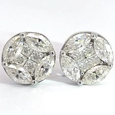 One of a kind precious moissanite studs hand crafted with 925 silver and vvs1 quality moissanite. These earrings are 10mm in size and will definitely catch the eyes of anyone who's near you ! These earrings are the perfect gift for that special somebody, the shine on the earrings really do speak for itself, absolutely marvellous ! these earings are in hand easy to ship for fast delivery. White Gold Moissanite Cluster Earrings, White Round Diamond Cut Cluster Earrings, Dazzling Round Cluster Earrings For Anniversary, Diamond White Diamond Cut Cluster Earrings, Diamond White Cluster Earrings With Diamond Cut, Gia Certified Round Cut Diamond Cluster Earrings, Gia Certified Silver Diamond Earrings In Sterling Silver, White Round Cluster Earrings With Diamond Cut, White Lab Grown Diamond Cluster Earrings