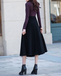 * A high-end long wool skirt with wide hem, very cool. * Made of wool blends, fully lined and with two side pockets. * Fixed waist with wide waistband and side invisible zipper. * Can custom make waist size and skirt length. * Material: Outer-50% wool, 50% polyester; lining-100% polyester * Washing instructions: Dry Clean Only * Size: True to US size, US 0-US 14 are available, you can let us know your usual size and height in your order. * Shipping: Free shipping Processing time : 5-7 Business d Black A-line Maxi Skirt For Winter, Winter Evening Midi Skirt, Winter Pleated Full Maxi Skirt, Pleated Maxi Skirt For Fall Evening, Pleated Maxi Skirt For Evening In Fall, Fall Evening Pleated Maxi Skirt, Black Maxi Skirt For Winter Evening, Chic A-line Maxi Skirt For Winter, Winter Formal Lined Pleated Skirt