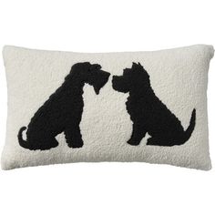 a black and white pillow with two dogs on it