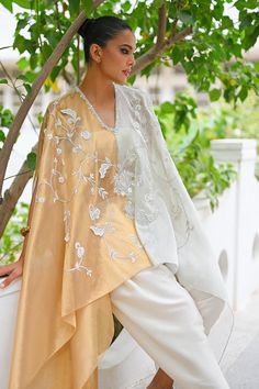 Rida Elegant Palazzo Set With Sheer Dupatta And Cape Sleeves, Elegant Palazzo Set With Cape Sleeves For Reception, Elegant Georgette Dupatta In Cape Style, Elegant Georgette Cape Dupatta, Elegant Tissue Silk Palazzo Set With Traditional Drape, Elegant Cape Dupatta For Eid, Elegant Tissue Silk Palazzo Set, Elegant Palazzo Set With Cape For Festive Occasions, Elegant Cape Palazzo Set For Festive Occasions