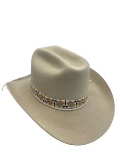 Hand-loomed glass beads Bead-work 19 inches long Sustainably sourced elk leather tie Adjustable sterling silver knot bead allows fit to any hat Classic Handmade Adjustable Hat Bands, Traditional Adjustable Hat For Formal Occasions, Handmade Adjustable Formal Hats, Artisan Fitted Hat Bands For Rodeo, Traditional Adjustable Jewelry For Rodeo, Handwoven Western Hat Band For Brimmed Hats, Western Brimmed Hat Band Handwoven, Festival Brown Beaded Hat Bands, Adjustable Beaded Wide-brim Fedora