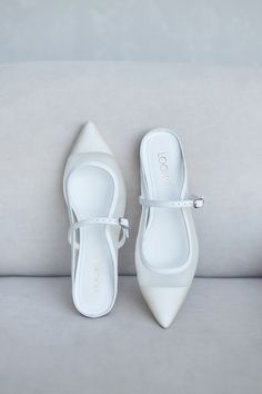 White tulle ballerina flats with arch strap and covered closed pointy toe are made-to-measure from a soft mesh and natural leather with a comfortable low heel.  Transparent and minimalistic, made only from high-quality materials, these ballerina shoes will perfectly complement any look.  Sort cushioned insoles along the entire length of the shoe will remember the position of the foot and add comfort. Anti-slip outsoles are a mixture of leather chips and rubber, it's more wear-resistant than leat White Pointed Toe Ballet Flats With Leather Sole, Elegant Ballet Flats With Translucent Outsole, White Pointed Toe Ballet Flats For Evening, Leather Closed Toe Slingback Pumps For Wedding, Mesh Flats, Shoe Company, Ballerina Shoes, White Mesh, Ballerina Flats