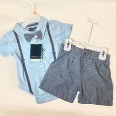 Top Onesie With Suspenders And Bow Tie! Matching Blue Button-Up Shorts Size 9/12 Mo New Fitted Blue Playtime Sets, Cute Fitted Sets With Buttons, Casual Blue Buttoned Sets, Casual Blue Sets With Buttons, Blue Bottoms For Playtime In Spring, Cotton Sets With Button Closure For Playtime, Cotton Playtime Sets With Button Closure, Blue Buttoned Sets For Spring, Blue Buttoned Set For Spring