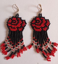 Rose shape dangle earrings. Earrings are 1 1/2 inches long. Earrings are done in the brick stitch style, The Brick, Brick Stitch, Rose Earrings, Long Earrings, Jewelry Earrings Dangle, Dangle Drop Earrings, Dangle Earrings, Roses, Jewelry Earrings