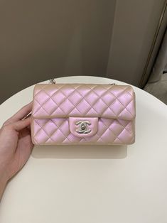 Chanel 21K Quilted Mini RectangularIridescent Pink Calfskin SHW20 x 12.5 x 6.5 cmChain drop 53 cmMicrochipDec 2021New w SealIncludes full set box, dust bag and receiptRTP 7090 sgdPrice now 6400 sgd 4700 usd CN5639-01 Luxury Pink Rectangular Box Bag, Luxury Pink Box Bag For Everyday Use, Luxury Chic Bags With Diamond Quilting, Luxury Pink Rectangular Case Bag, Luxury Modern Pink Box Bag, Luxury Diamond-quilted Rectangular Bag, Cheap Pink Square Box Bag, Chanel Mini Bag Set, Chanel 22 Mini