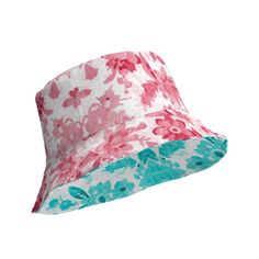 This Cerise and Teal Floral Reversible bucket hat can be worn on both sides, making it easy to match with different outfits. Made of breathable premium fabric, this hat will become your go-to streetwear accessory. * 100% polyester * Fabric weight: 8.1 oz/yd² (275 g/m²)  * Moisture-wicking and breathable fabric * Linen feel material * Reversible * Available in 2 sizes * Blank product components sourced from China Casual Reversible Bucket Hat, Pink Reversible Bucket Hat With Curved Brim, Spring Reversible Bucket Hat, Reversible White Bucket Hat For Summer, White Reversible Bucket Hat For Summer, White Reversible Short Brim Hat, Reversible Summer Bucket Hat One Size, Casual Reversible Pink Bucket Hat, White Short Brim Reversible Hat