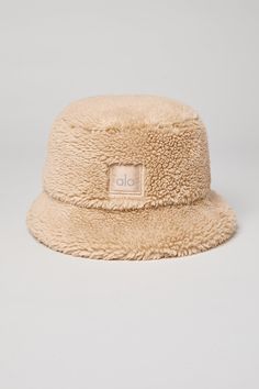 The iconic bucket hat just got a Sherpa update! Top off your cool-weather look with this plush Sherpa bucket hat, featuring a full, textured brim. Plush sherpa (faux fur) Center front woven patch Alo logo Sherpa Bucket Hat, Bucket Hat Winter, Winter Shoot, Winter Bucket Hat, Cold Weather Hats, Makeover Bedroom, Ballet Pink, January 2023, Bucket Hats