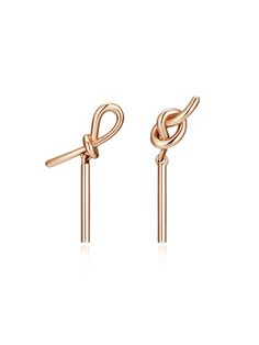 Editor's NotesJ.ESTINA designs classic yet elegant accessories that will be your new go-to- Asymmetric design earrings- Knot shape design- Simple and easy earrings that's good for daily wearingMeasurements (in.).- W x H: 0.3 in. x 0.5 in.Composition & Care- 14K gold- Do not washDesigner- by J.ESTINA Accessories Design Sketch, Easy Earrings, Modern Diamond Jewelry, Movie Jewelry, Jewellery Design Sketches, Rope Jewelry, Jewelry Knots, Chain Loop, Jeweled Earrings