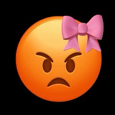 an orange emoticure with a pink bow on it's head