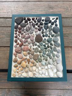 there are many different rocks in this shadow box