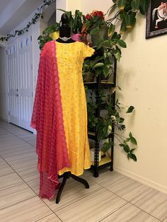 muslin silk anarkali gown with bandini print all over.  Yellow dress with pink duppatta: size 36in and extendable to 40in Yellow dress with green duppatta: size 38in and extendable to 42in Pink dress: size 38in and extendable to 40in Anarkali Party Wear, Silk Anarkali Gown, Contrast Dupatta, Yellow Anarkali, Silk Anarkali, Yellow Gown, Maggam Work Blouses, Anarkali Gown, Haldi Ceremony