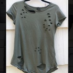 a t - shirt that has holes in it