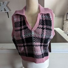 -Adorable Pink And Black Plaid Sweater Vest -Fits Like A Size 12 -100% Polyester -No Visible Signs Of Wear Trendy Pink Sweater Vest For Fall, Trendy Pink Sweater Vest For Winter, Trendy Pink Sweater Vest For Spring, Trendy Pink Sleeveless Sweater, Pink Sleeveless Winter Top, Trendy Sleeveless Pink Sweater, Casual Pink Sleeveless Outerwear, Pink Sleeveless Top For Winter, Casual Pink Winter Sweater Vest