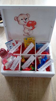 an open box filled with different types of candies