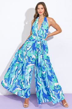 A printed woven jumpsuit featuring plunging V halter neckline, sleeveless, wide leg, self sash tie and bare backDetails:Self : 100% PolyesterLining : 100% PolyesterSize & Fit- Model is 5`8" And Wearing Size Small- Measurements Taken From Size Small- Approx. Length: 58" Blue Beach Jumpsuits And Rompers With Tie Waist, Blue Summer Jumpsuits And Rompers With Tie Waist, Beachwear Halter Neck Jumpsuits And Rompers For Vacation, Halter Neck Jumpsuits And Rompers For Beach Vacation, Halter Neck Jumpsuits And Rompers For Vacation, Blue Maxi Length Jumpsuits And Rompers For Spring, Blue Maxi Length Jumpsuits For Spring, Summer Halter Neck Jumpsuit With Tie Back, Spring Halter Neck Jumpsuit With Tie Back