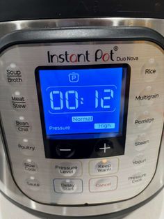 an instant pot with the time displayed on it