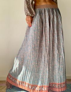 Beautiful ethnic inspired design long silk skirt with plaids,  Loose easy fitting with elastic waist  Oryginal and stylish for daily wear as well as ocassion MEAESURE Free size  Waist elastic 26-35" Length 39" MATERIAL * silk  Thank you for looking Spring Floor-length Pleated Skirt, Bohemian Wide Leg Maxi Dress For Spring, Spring Boho Print Maxi Skirt, Bohemian Silk Maxi Skirt For Spring, Flowy Boho Print Maxi Skirt, Spring Bohemian Silk Maxi Skirt, Flowy Boho Print Tiered Maxi Skirt, Bohemian Spring Maxi Dress With Relaxed Skirt, Bohemian Dress With Gathered Skirt