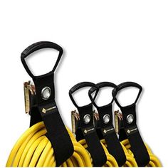 three yellow hoses are connected to each other with black handles and metal fittings