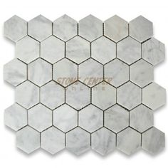 white marble hexagon tiles with grey veining