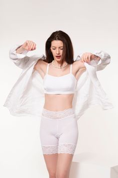 Fitted Cotton Yoga Shorts, Daywear Bottoms With Built-in Bra And Stretch, High Stretch Cotton Bottoms With Built-in Shorts, Stretch Shorts With Built-in Bra For Loungewear, Stretch Bottoms With Built-in Bra For Daywear, Cotton Tops With Built-in Bra For Relaxation, Stretch Cotton Tops For Daywear, Fitted Seamless Cotton Bottoms, White High Stretch Cotton Bottoms